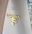 Ensemble, Prada (Italian, founded 1913), (a) cotton, metal, silk, (b, c) cotton, (d, e) snakeskin, leather, Italian